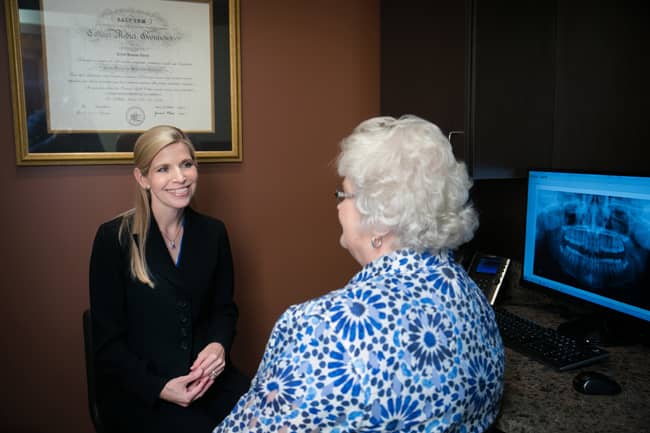 Dr. Cheek Visiting with Patient