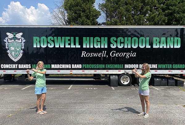 Dr. Cheek supporting the Roswell Highschool band